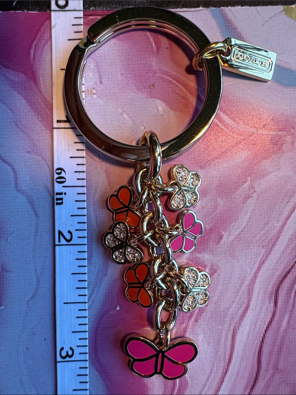 Coach Gold-Tone Butterfly Charms Keyring in Pink and Orange